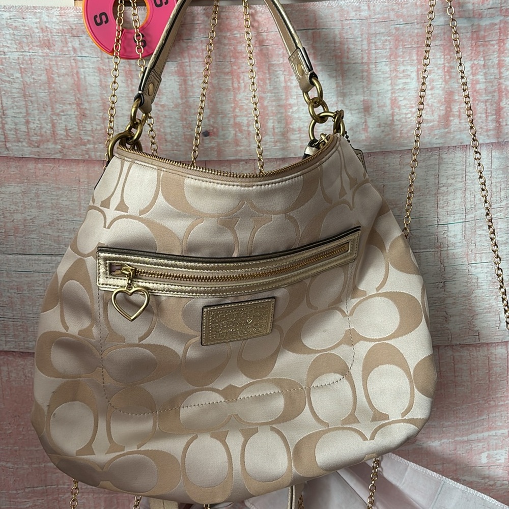 Coach Poppy signature Shoulder Bag with crossbody strap and hang tags.
